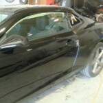Photographs of a 2014 Chevrolet Camaro that was in an accident and repaired by Elite Paint & Body Shop in West Palm Beach Florida